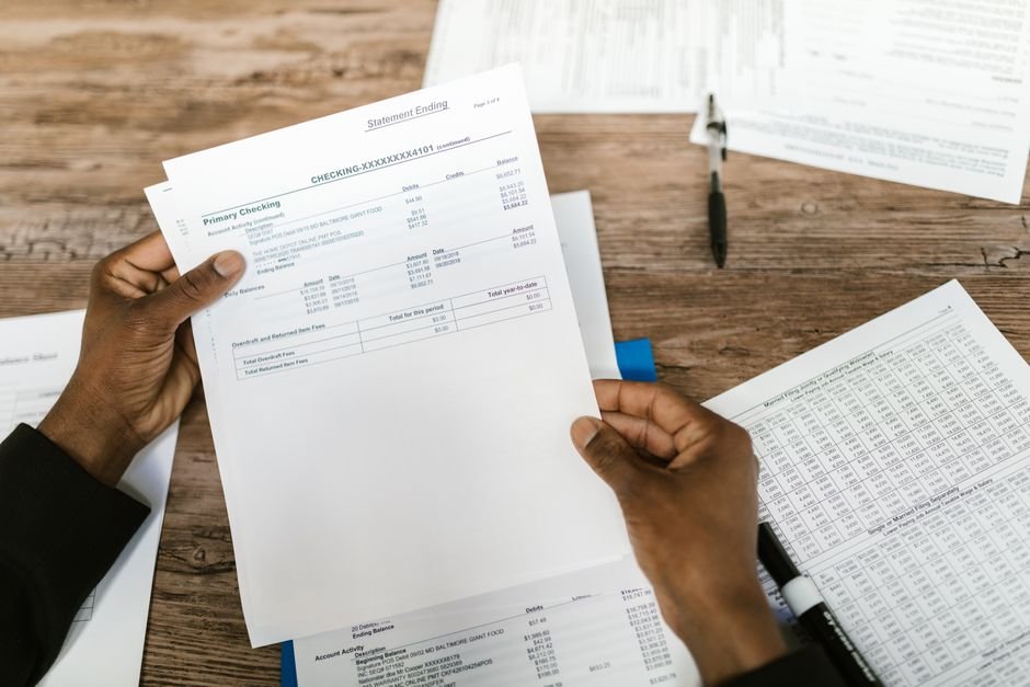 German investor reviewing ETF tax documents and calculations at a desk