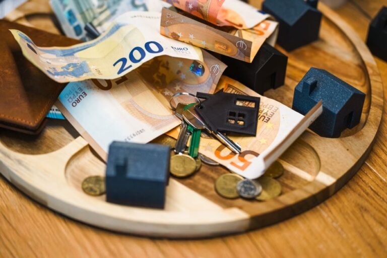 European city skyline with money concept for ETF vs real estate investment comparison