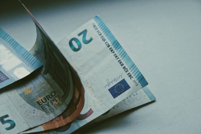 European money investment 2026 with euro coins and financial charts showing best opportunities