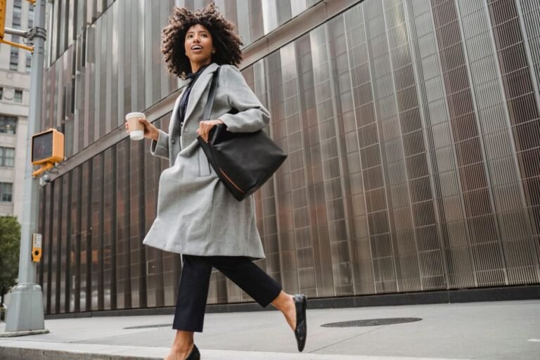 Person walking away from office building toward financial independence in Europe