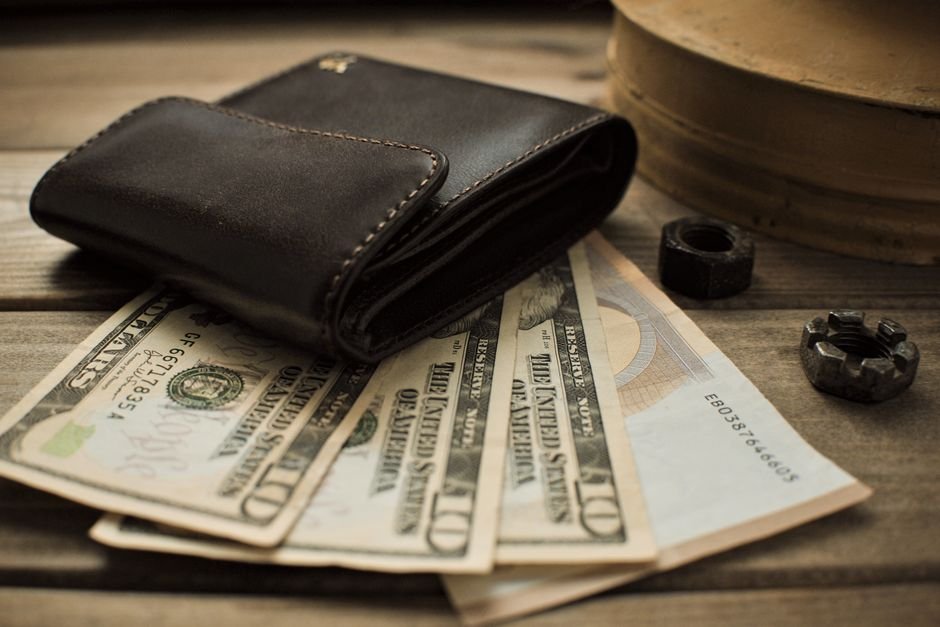 European professional reviewing salary investment budget and personal finance plan