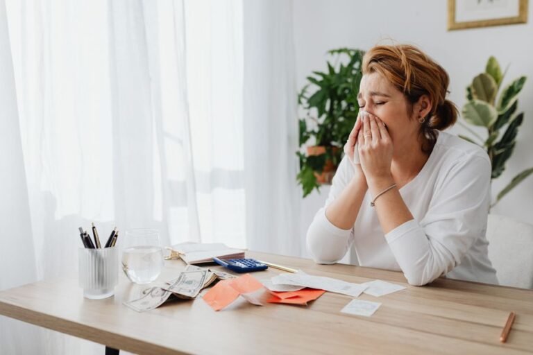 Worried middle-aged person using a retirement calculator, concerned about retirement savings in Europe