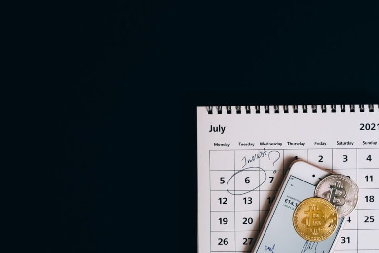 European investing monthly plan with charts, coins and financial documents on a desk