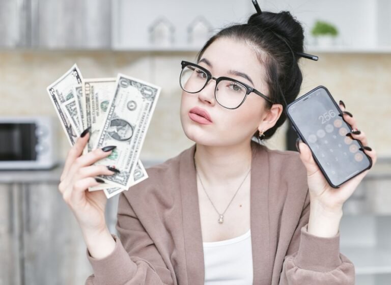 Young person investing money with a small budget to start building wealth