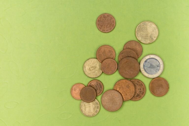 Euro coins growing into a tree, symbolizing how to invest in ETF with 50 euros