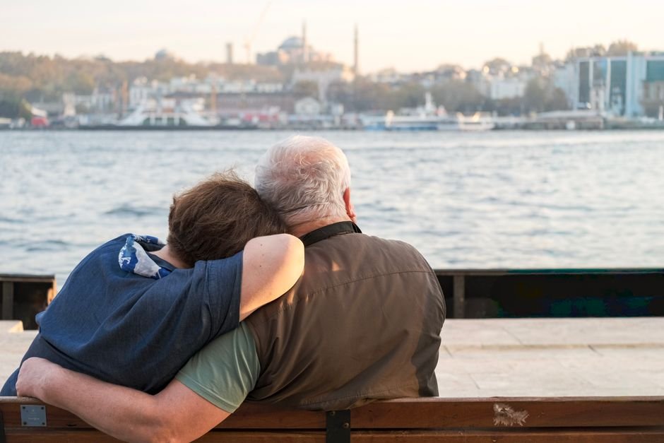 Peaceful retirement in Europe with couple enjoying sunset by the Mediterranean coast, early retirement lifestyle