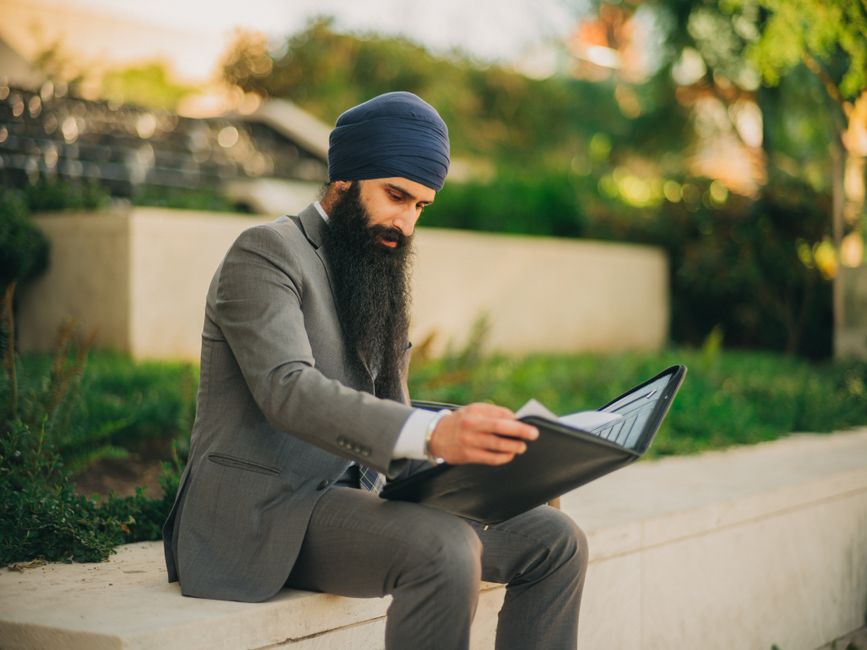 Calm man reviewing investment portfolio to find the safest investment platform in Europe
